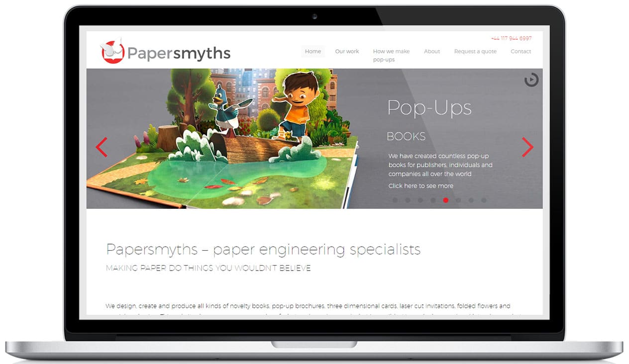 Papersmyths homepage hero image on a laptop